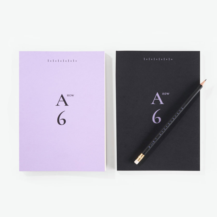 The Antwerp Six notebook and pencil